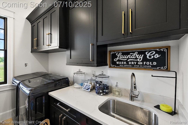 6295 Canter Creek Trl, Grand Blanc, MI 48439 - laundry area featuring cabinet space and independent washer and dryer