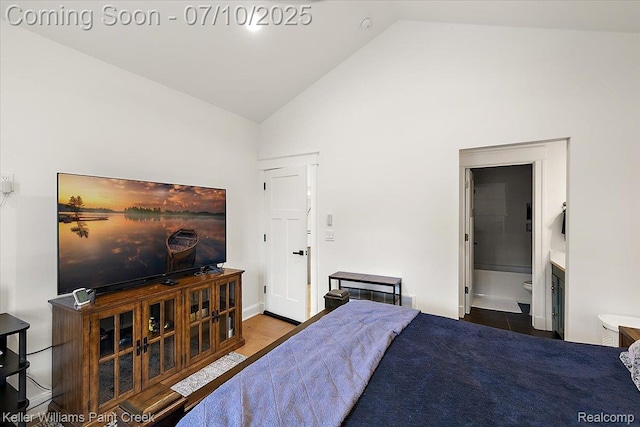 6295 Canter Creek Trl, Grand Blanc, MI 48439 - bedroom with high vaulted ceiling and ensuite bath
