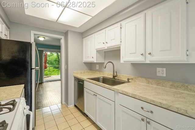 1481 Oakbrook E, Rochester, MI 48307 - kitchen with stainless steel dishwasher, white range with gas stovetop, light countertops, and white cabinetry