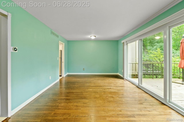 1481 Oakbrook E, Rochester, MI 48307 - spare room featuring wood finished floors and baseboards