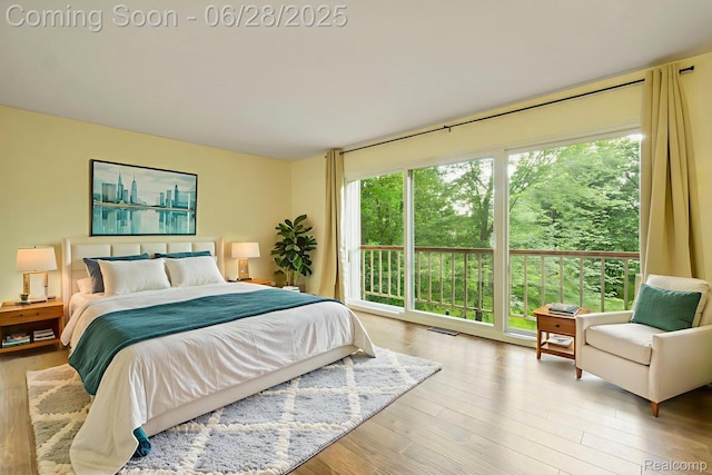 1481 Oakbrook E, Rochester, MI 48307 - bedroom with access to exterior and light wood-style flooring