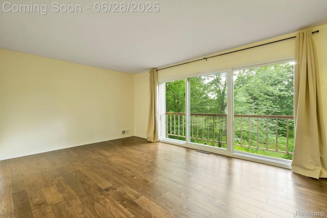 1481 Oakbrook E, Rochester, MI 48307 - unfurnished room with dark wood-style flooring
