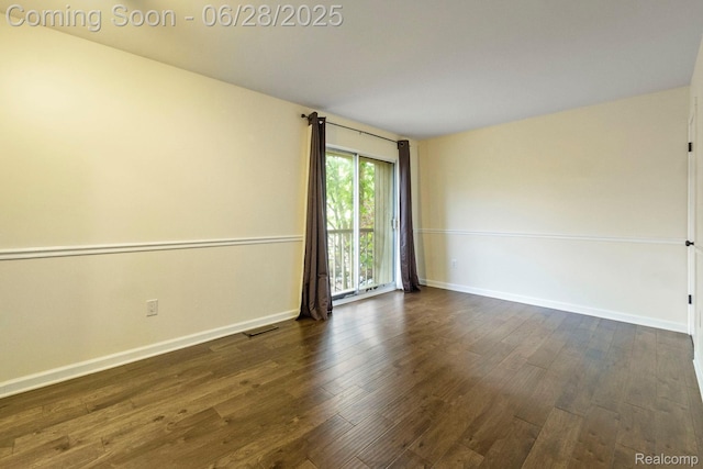 1481 Oakbrook E, Rochester, MI 48307 - empty room with dark wood finished floors and baseboards