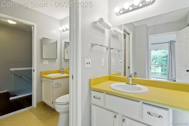 1481 Oakbrook E, Rochester, MI 48307 - bathroom with vanity and tile patterned flooring