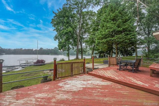 2624 Lynch, Highland, MI 48357 - wooden terrace featuring a water view, a lawn, and outdoor dining space