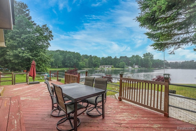 2624 Lynch, Highland, MI 48357 - wooden terrace featuring a water view and outdoor dining space