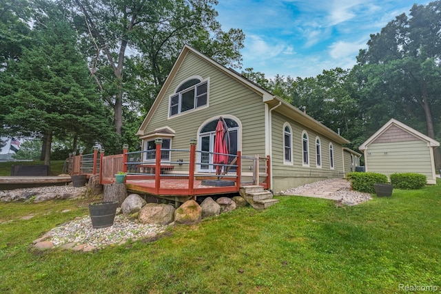 2624 Lynch, Highland, MI 48357 - view of front of property with a front lawn and a deck