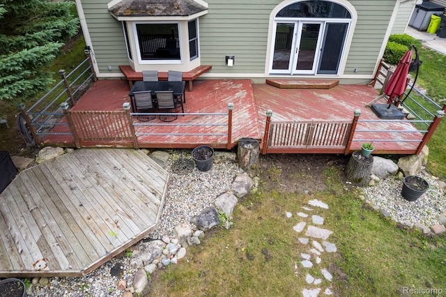 2624 Lynch, Highland, MI 48357 - deck featuring outdoor dining area