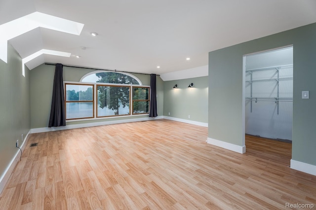 2624 Lynch, Highland, MI 48357 - unfurnished room with a skylight, light wood finished floors, and recessed lighting