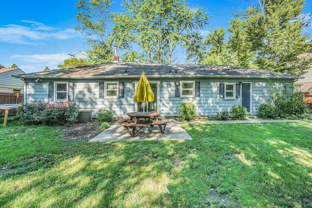 1315 Sutherland Ave, Kalamazoo, MI 49006 - rear view of house with a patio