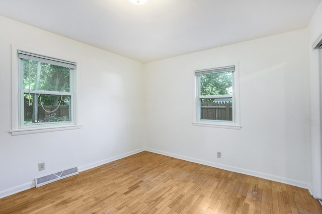1315 Sutherland Ave, Kalamazoo, MI 49006 - unfurnished room with light wood-type flooring and baseboards