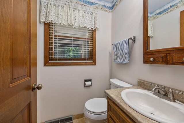 2360 Montclair Ave NW, Walker, MI 49544 - bathroom with toilet and vanity