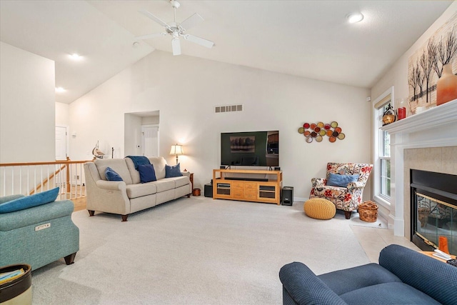 7520 Haflinger Cir, Kalamazoo, MI 49009 - living room featuring carpet floors, a ceiling fan, a fireplace, and high vaulted ceiling