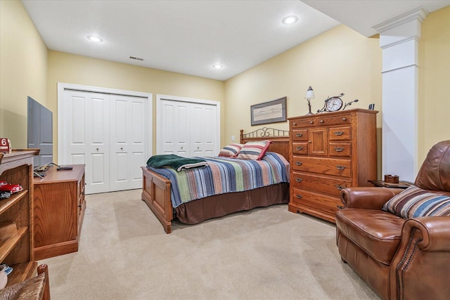7520 Haflinger Cir, Kalamazoo, MI 49009 - bedroom with two closets, light colored carpet, and recessed lighting