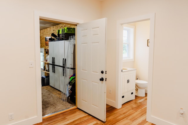 2634 Fitzgerald Ave, Fremont, MI 49412 - bathroom with wood finished floors and toilet