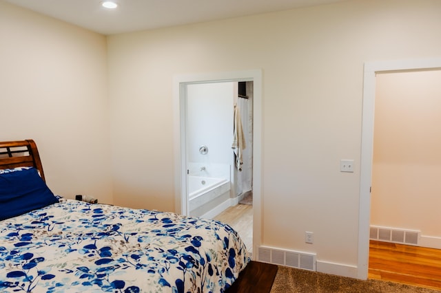 2634 Fitzgerald Ave, Fremont, MI 49412 - bedroom featuring wood finished floors and recessed lighting