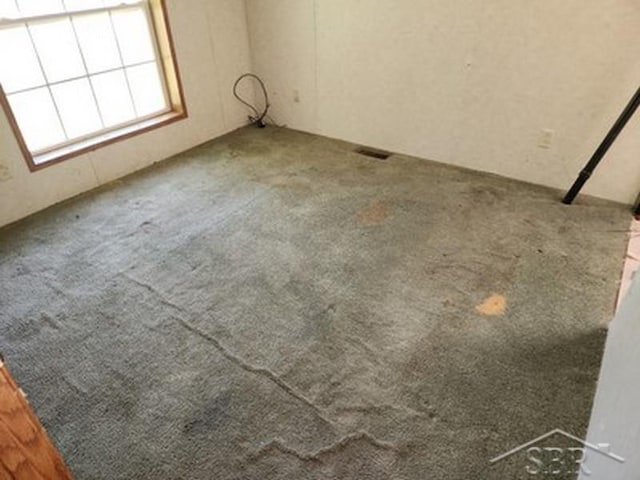 2502 Lynnwood Ave, Saginaw, MI 48601 - unfurnished room with carpet flooring