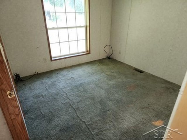 2502 Lynnwood Ave, Saginaw, MI 48601 - view of carpeted spare room