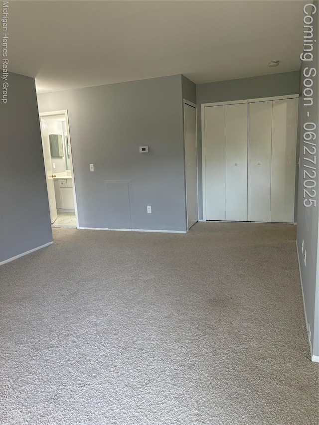 30028 W 12 Mile Rd, Farmington, MI 48334 - unfurnished bedroom with carpet floors and ensuite bathroom