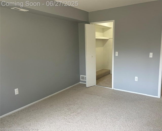 30028 W 12 Mile Rd, Farmington, MI 48334 - unfurnished bedroom featuring carpet flooring and a closet