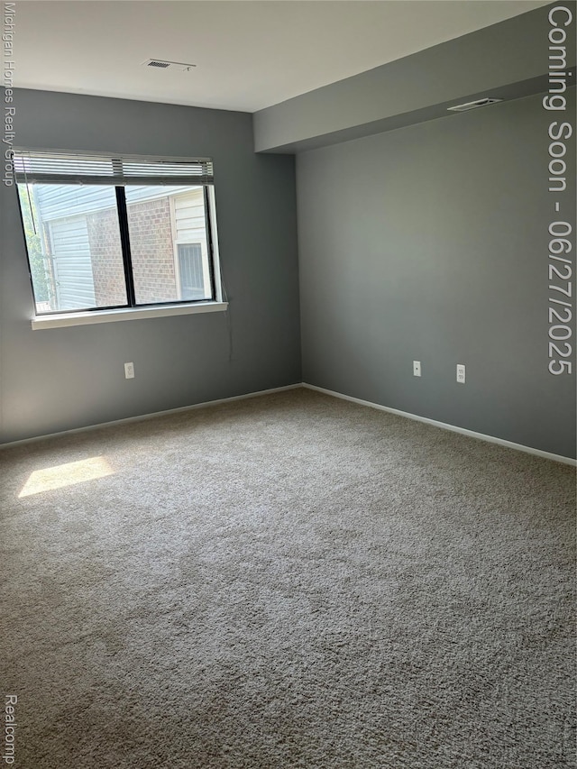 30028 W 12 Mile Rd, Farmington, MI 48334 - carpeted empty room featuring baseboards