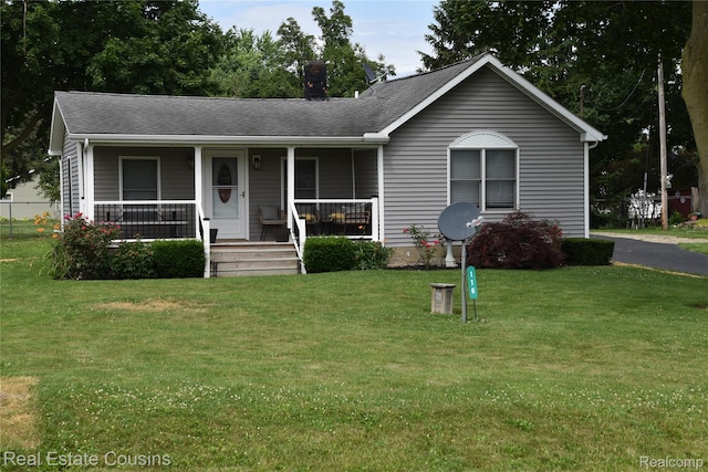 116 Park St, Gaines, MI 48436 - single story home featuring a front lawn and covered porch