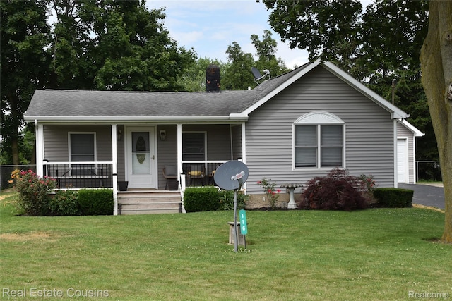 116 Park St, Gaines, MI 48436 - single story home with a front yard, roof with shingles, a chimney, a porch, and asphalt driveway