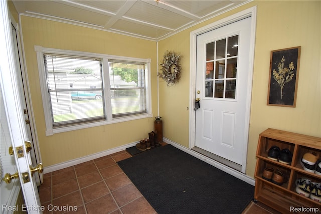116 Park St, Gaines, MI 48436 - doorway to outside with dark tile patterned floors and baseboards