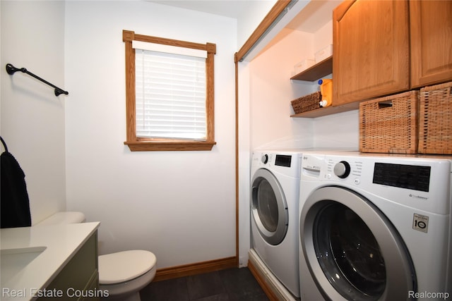 116 Park St, Gaines, MI 48436 - laundry room featuring washing machine and clothes dryer and dark tile patterned flooring