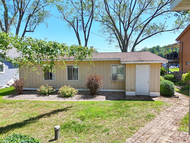 31467 Maple Island Rd, Dowagiac, MI 49047 - view of front of house with board and batten siding and a front yard