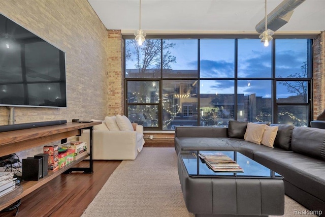 127 S Union St, Traverse City, MI 49684 - living area featuring floor to ceiling windows and wood finished floors