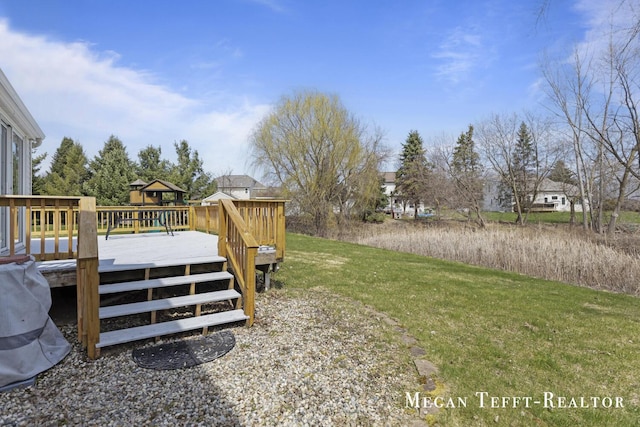 6641 Laguna Vista Dr NE, Rockford, MI 49341 - view of grassy yard featuring a wooden deck