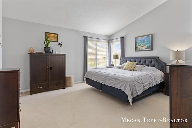 6641 Laguna Vista Dr NE, Rockford, MI 49341 - bedroom featuring vaulted ceiling and light colored carpet