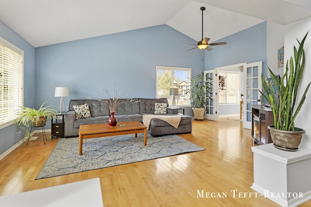 6641 Laguna Vista Dr NE, Rockford, MI 49341 - living room featuring wood-type flooring, a ceiling fan, and high vaulted ceiling