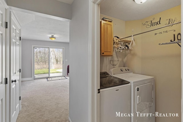 6641 Laguna Vista Dr NE, Rockford, MI 49341 - laundry room featuring cabinet space, washing machine and dryer, carpet floors, and a textured ceiling