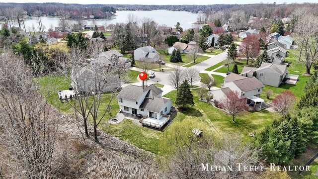 6641 Laguna Vista Dr NE, Rockford, MI 49341 - aerial view of residential area with a nearby body of water