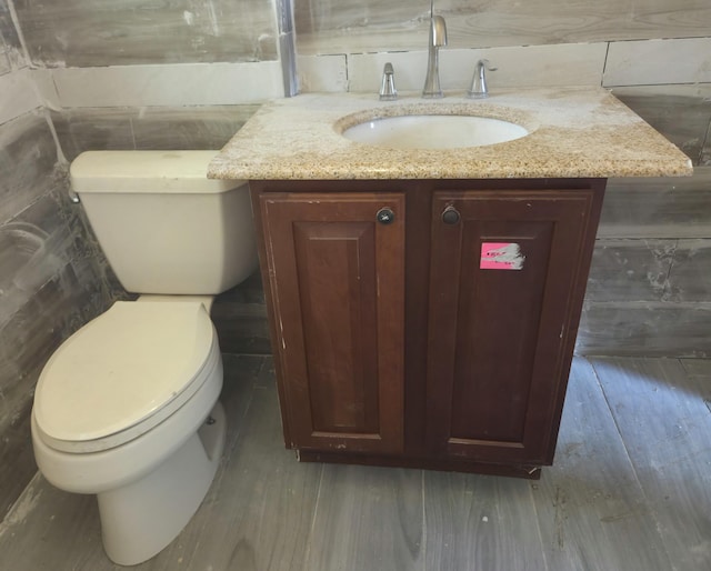 3742 W Grand St, Detroit, MI 48238 - half bathroom with vanity and wood finished floors