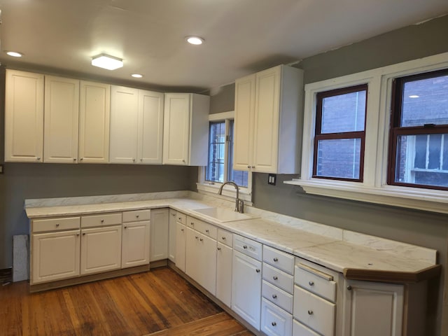 3742 W Grand St, Detroit, MI 48238 - kitchen featuring light countertops, dark wood-type flooring, white cabinets, and recessed lighting