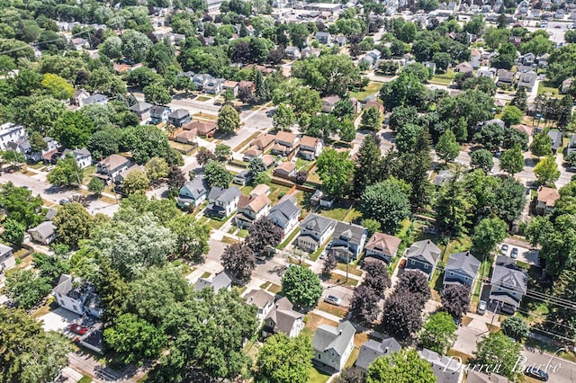 1118 Sibley St NW, Grand Rapids, MI 49504 - aerial view of property and surrounding area featuring nearby suburban area
