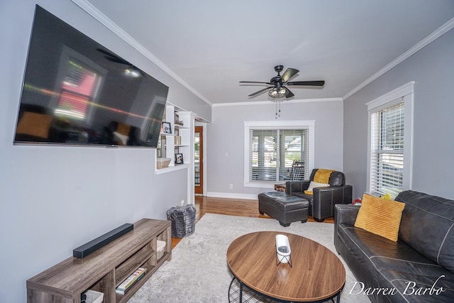 1118 Sibley St NW, Grand Rapids, MI 49504 - living room with crown molding, wood finished floors, and ceiling fan