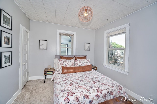 1118 Sibley St NW, Grand Rapids, MI 49504 - bedroom with carpet and baseboards