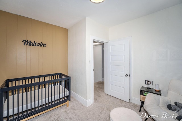 1118 Sibley St NW, Grand Rapids, MI 49504 - bedroom with carpet flooring and a crib