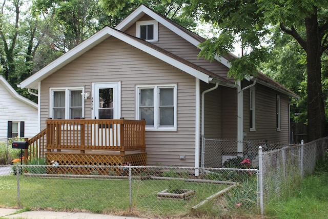 3316 Adams St, Kalamazoo, MI 49008 - view of front of house featuring a wooden deck and a fenced backyard