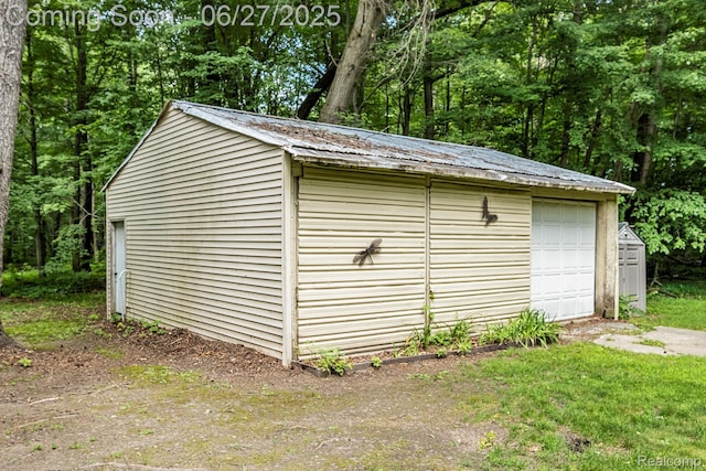 15375 Murray Rd, Byron, MI 48418 - view of outbuilding featuring concrete driveway