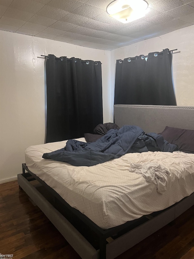 1297 W Kurtz Ave, Flint, MI 48505 - bedroom with wood finished floors and baseboards