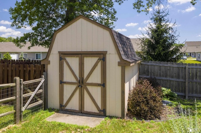 7558 Indian Rd, Temperance, MI 48182 - view of shed featuring a fenced backyard
