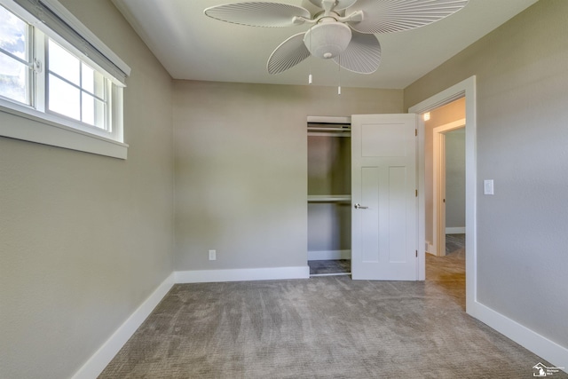 7558 Indian Rd, Temperance, MI 48182 - unfurnished bedroom featuring carpet, a ceiling fan, and a closet