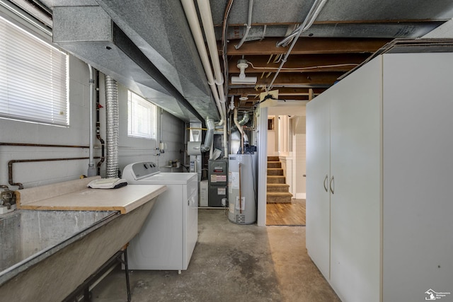 7558 Indian Rd, Temperance, MI 48182 - basement featuring gas water heater, washing machine and dryer, and stairway