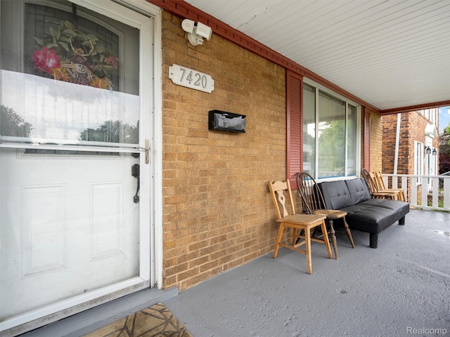 7420 Coolidge, Center Line, MI 48015 - entrance to property featuring covered porch and brick siding
