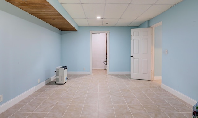 10895 Riley St, Zeeland, MI 49464 - unfurnished room with a drop ceiling, light tile patterned floors, and recessed lighting